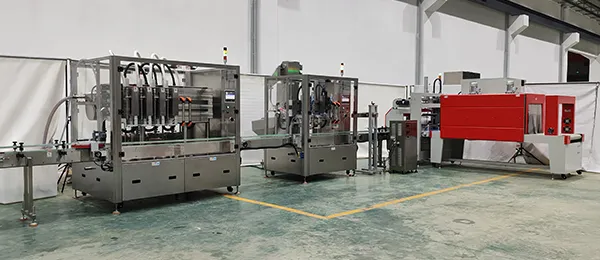 Línea Integrada de Envasado y Empacado Retráctil para Productor de Aceite para Consumo Alimenticio en Guatemala